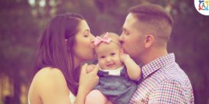 a mom and a dad kissing their girl daughter's chicks - Autism