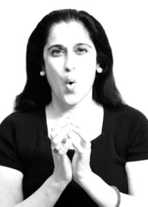  Face Yoga Therapy practitioner making a comical face using her hands.- Autism Connect