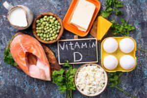 "A variety of foods rich in vitamin D, such as fatty fish like salmon and tuna, fortified dairy products, eggs, and mushrooms, arranged on a plate." - Autism spectrum disorder