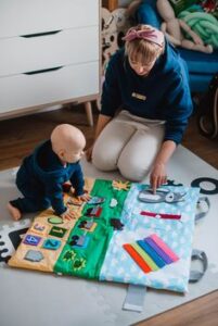 "Image of a woman and a child engaging in do-it-yourself (DIY) activities together."