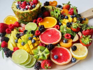 Plate of assorted fruit, promoting holistic eating for improved sensory processing in neurodiverse children. - Autism Connect