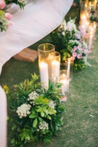 2)Version 1: Alt text: "Wedding ceremony adorned with candles and flowers, symbolizing a lifelong commitment. - Autism Connect 